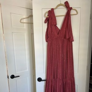 Sundress size M/L never worn. Ties on shoulder, maxi dress with sequins